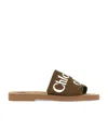 Chloé Woody Logo-print Canvas Slides In Brown