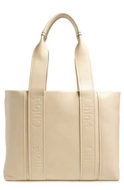 Chloé Logo Embossed Open Top Tote Bag In Beige