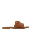 Chloé Woody Embroidered Logo Leather Slide Sandal In Brown