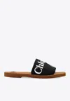 Chloé Woody Flat Logo Ribbon Slide Sandals In Black