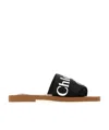 Chloé Woody Flat Logo Ribbon Slide Sandals In Black