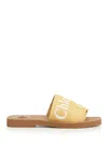 Chloé Woody Logo Embroidered Flat Slides In Brown