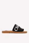 Chloé Woody Flat Logo Ribbon Slide Sandals In Black