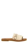 Chloé X High Summer Woody Embroidered Logo Flat Sandals In Sand