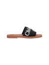 Chloé Woody Flat Logo Ribbon Slide Sandals In Black