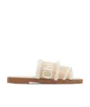 Chloé Woody Shearling-trimmed Logo-print Canvas Slides In Nude
