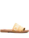 Chloé Logo Woody Flat Mules In Yellow
