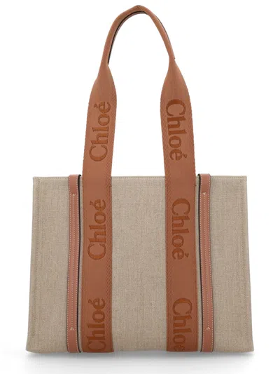 Chloé Woody Tote Bag In Linen Canvas, Calfskin And Webbing With Logo Embroidery In Sand