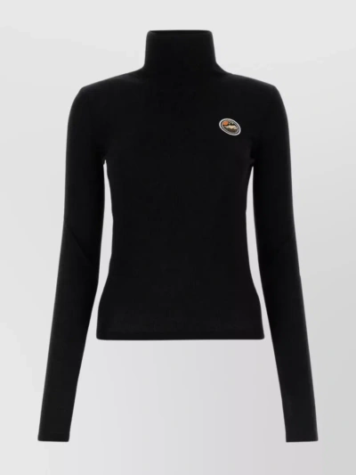 CHLOÉ WOOL BLEND TURTLENECK SWEATER WITH RIBBED TEXTURE