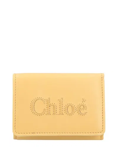 Chloé Yellow Leather Trifold Wallet Sense In Gold