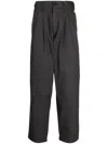Chocoolate Logo-patch Pleated Cotton Chinos In Grey
