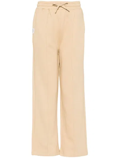 Chocoolate Logo Track Pants In Yellow