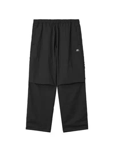 Chocoolate Logo-patch Panelled Trousers In Black