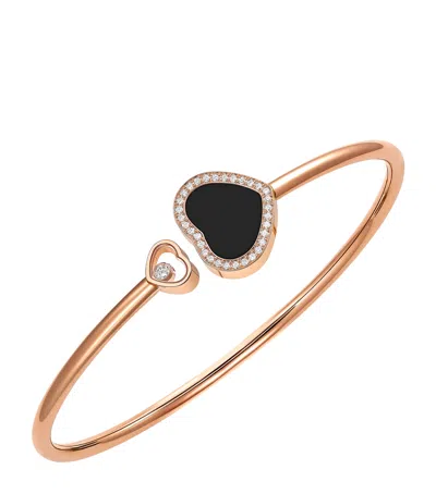 CHOPARD ROSE GOLD, DIAMOND AND ONYX HAPPY DIAMONDS BANGLE
