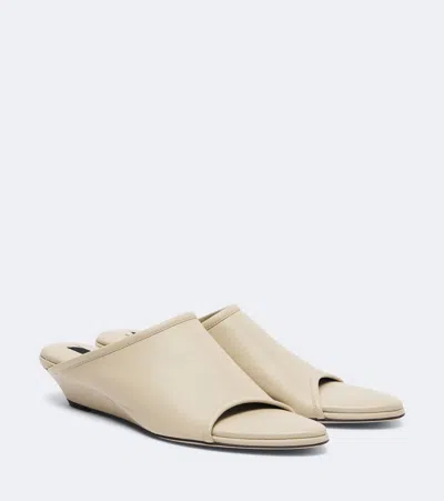 Christen Stretch Leather Wedge Mules In Beige