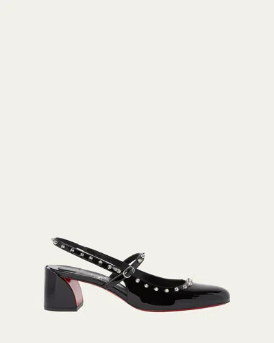 Christian Louboutin Janispikes Patent Red Sole Slingback Pumps In Black