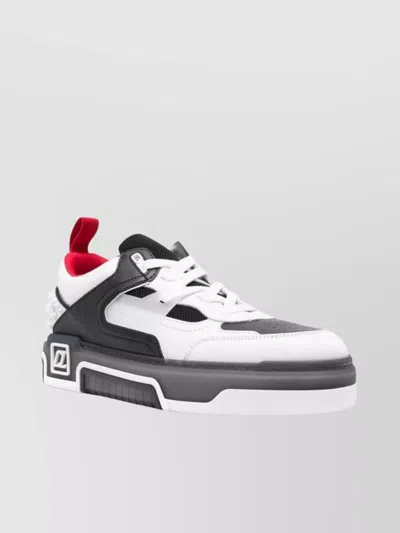 CHRISTIAN LOUBOUTIN LOW TOP SNEAKERS WITH SIGNATURE RED SOLE