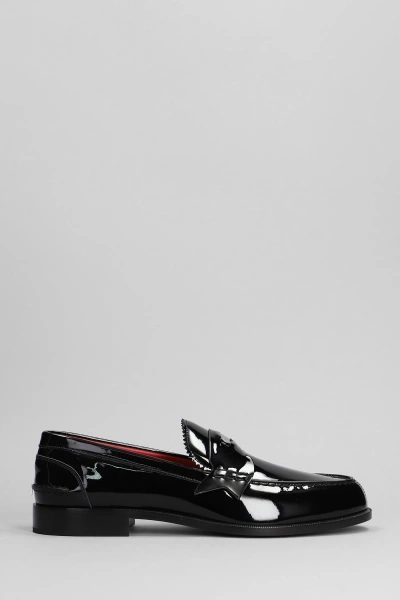 CHRISTIAN LOUBOUTIN PENNY LOAFERS IN BLACK PATENT LEATHER