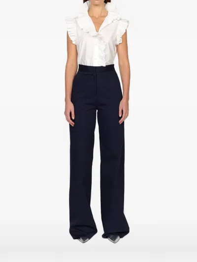 Christy Lynn Marfa Ruffled Sleeveless Blouse In White