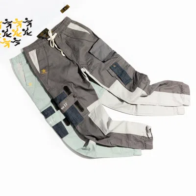 CHUKS COLLINS MEN'S BLUE / GREY GREY ACT SELF CARGO PANTS- CHUKS COLLINS DIFFUSION COLLECTION - TASOU - THE ATHLET