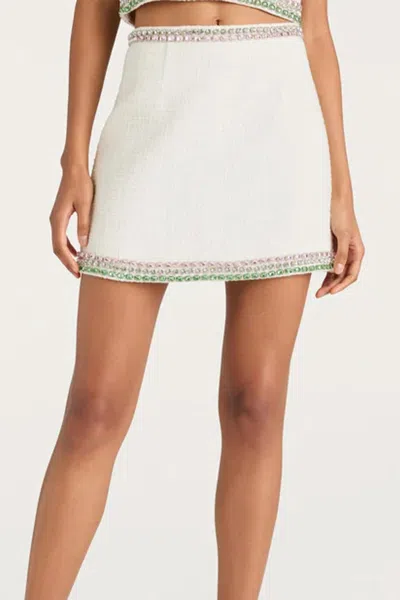 CINQ À SEPT VERITY MINI SKIRT IN GARDENIA MULTI