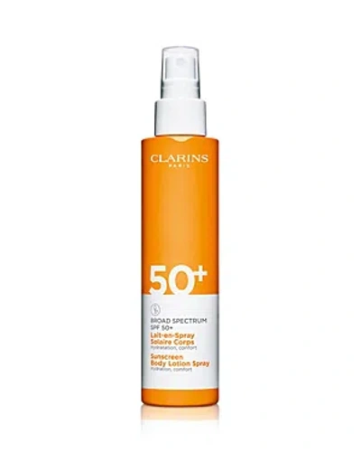 Clarins Sunscreen Body Lotion Spray Broad Spectrum Spf 50+ 5 Oz. In White
