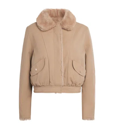 Claudie Pierlot Faux Shearling Reversible Parka In Red