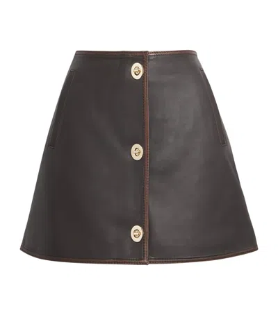 Claudie Pierlot Leather Turn-lock Mini Skirt In Brown