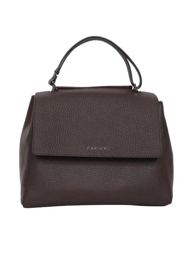 Claudio Orciani Hand Held Bag. In Brown