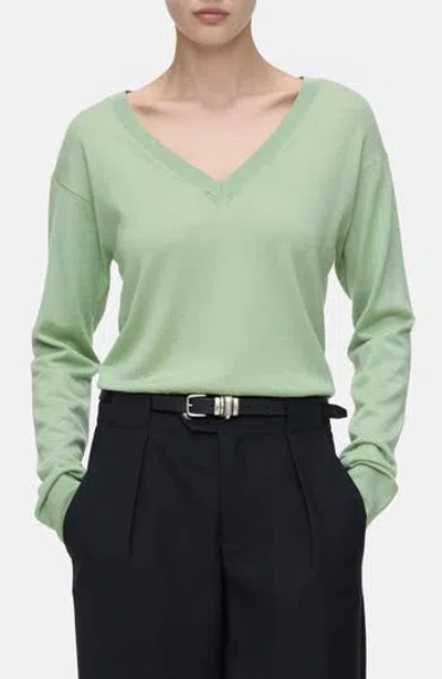 Closed V-neck Long Sleeve Organic Cotton Knit Top In Green