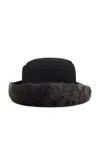 Clyde Reversible Shearling Bucket Hat In Black Silver Tip