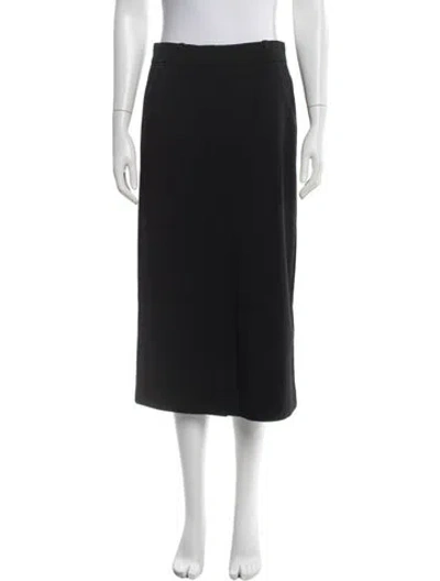 Pre-owned Co Wool Midi Length Skirt In Black