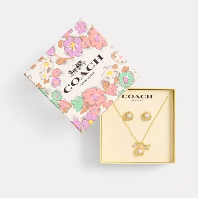 Coach In Gold