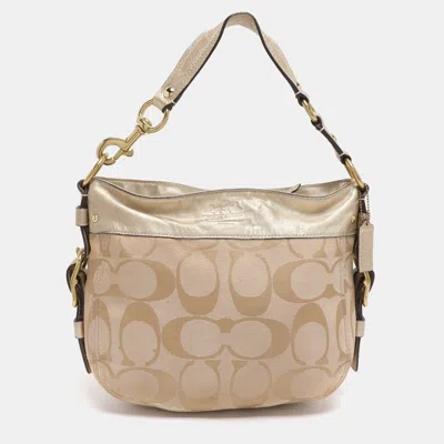 Pre-owned Coach Beige/gold Canvas And Leather Zoe Hobo In Sand