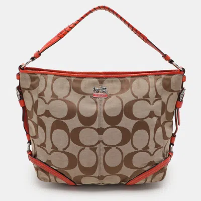 Pre-owned Coach Beige/orange Signature Canvas And Patent Leather Katarina Hobo