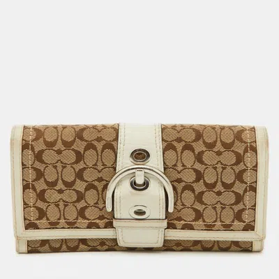 Coach Beige/white Signature Canvas And Leather Buckle Detail Continental Wallet In Sand