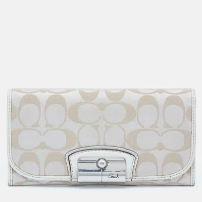 Coach Beige/white Signature Canvas And Leather Flap Continental Wallet