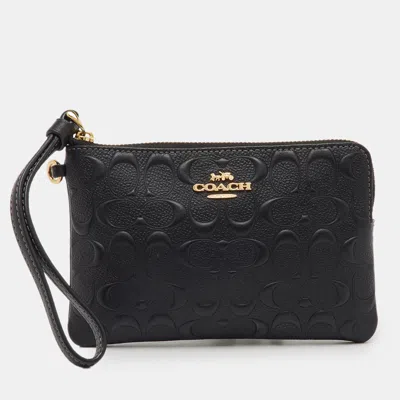 Pre-owned Coach Black Signature Embossed Leather Zip Wristlet