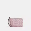 Coach Boxed Corner Zip Wristlet In Signature Canvas With Charms In Pink