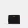 Coach In Brass/black