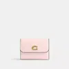 Coach In Brass/blush