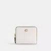 Coach In Brass/chalk