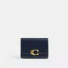Coach In Brass/dark Navy