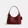 Coach In Brass/dark Ruby