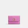 Coach In Brass/fuschia