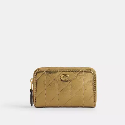 Coach In Brass/gold