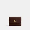 Coach In Burgundy