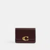 Coach In Brass/merlot