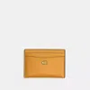 Coach In Brass/mustard Yellow