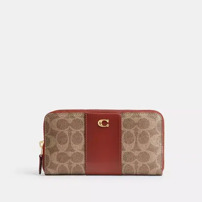Coach In Brass/tan/rust